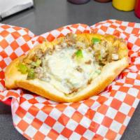 7. Small Pepper Onion Cheesesteak Sandwich · Seasoned beef rib steak, bell peppers, onions, melted white American cheese on a soft Italia...