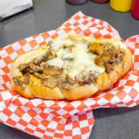 15. Small Mushroom Cheesesteak Sandwich · Seasoned beef rib steak, mushrooms, and melted white American cheese on a soft Italian roll.
