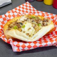 19. Small Mushroom Pepper Onion Cheesesteak Sandwich · Seasoned beef rib steak, mushrooms, bell peppers, onions, melted white American cheese on a ...