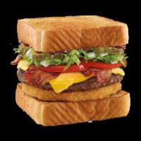 Bacon Cheeseburger TOASTER® · Hickory BBQ, Lettuce, Tomato, Onion, Pickle, Bacon, Cheese and Onion Ring on Texas Toast