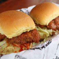 Buffalo Chicken Sandwich · crispy Buffalo chicken, lettuce, blue cheese.  2 sliders per order.  Wanna threesome?  Add a...