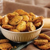 Crispy Pickle Chips · One of our Seasonal Favorites! Deep-fried spicy pickle chips served with our special Comebac...