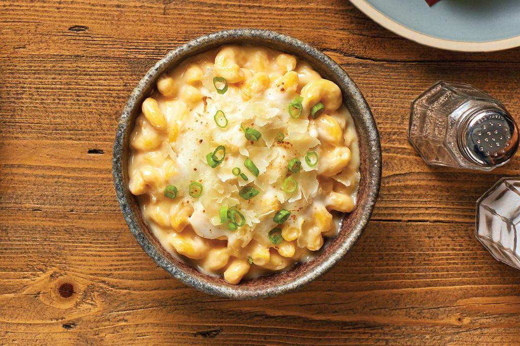 Loaded Mac & Cheese (Premium Side) · We did what? We made our creamy mac & cheese and mixed it with alfredo sauce, 3-cheese blend, parmesan cheese, and then topped it off with diced green onions. We couldn’t stop ourselves. 