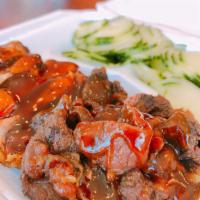 Chicken & Beef Combo · Served with rice and salad.