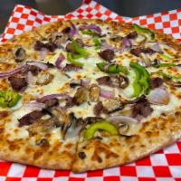 Philly Steak Pizza · Alfredo base topped with sirloin steak, onions, mushrooms, & green peppers.
