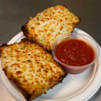 Garlic Mozzarella Bread · Two pieces with garlic butter spread and topped with melted mozzarella cheese served with ma...