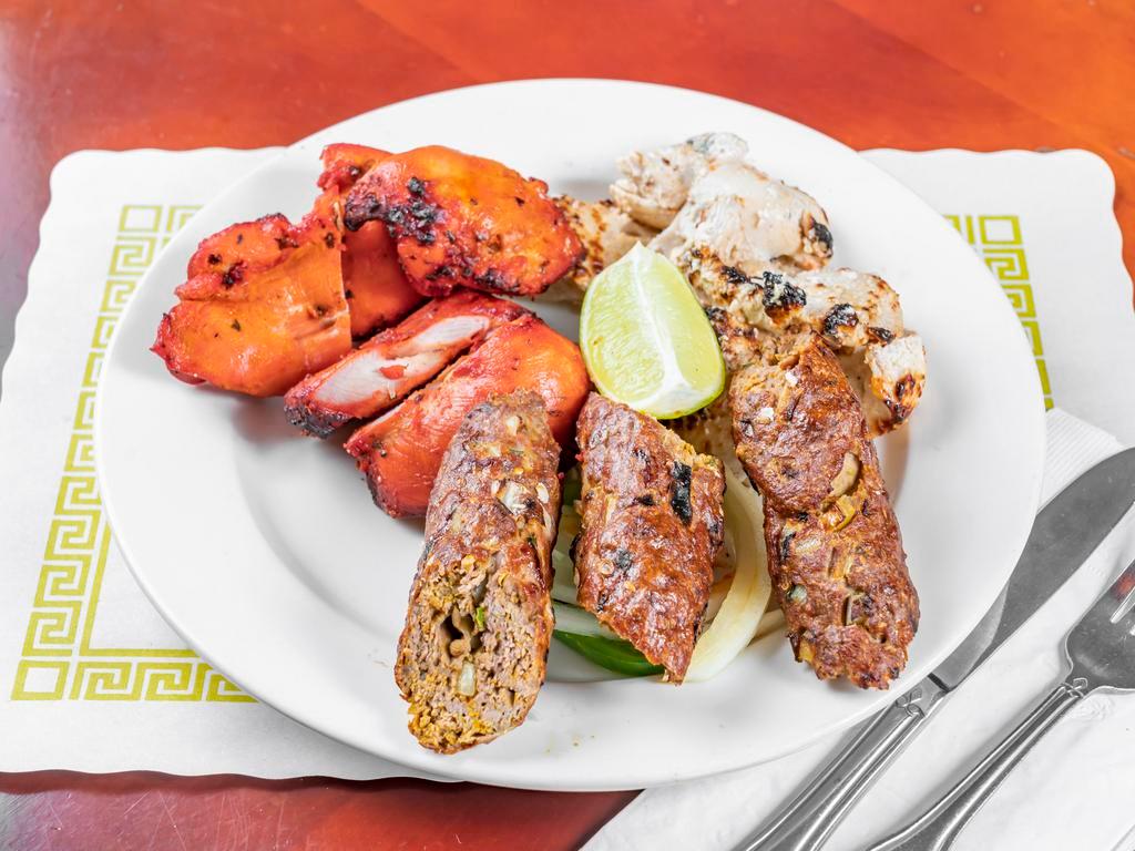 Tandoori Mix Grill  · Combination of lamb seekh kabab, chicken malai kabab and chicken tikka.