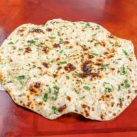 Aloo Paratha · Whole wheat bread stuffed with potatoes.