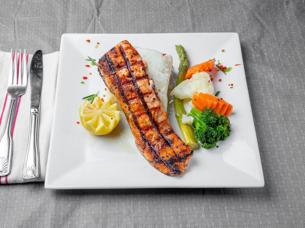 Salmon · Comes with garlic-herb sauce.