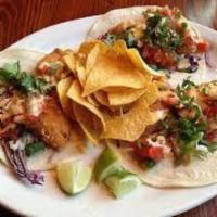 Soft Corn Taco · Choice of Meat served on soft white corn tortillas and garnished with onions, cilantro and s...