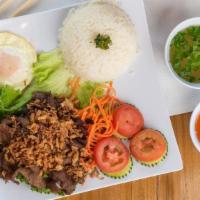 Chargrilled Rice Plate · Com thit nuong. Your choice of Chargrilled Protein. Served with steamed rice, a fried egg, t...
