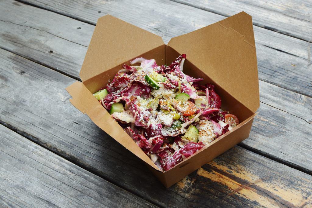 House Salad · Radicchio, tomatoes, cucumbers, red onion, pepperoncini, pecorino, and bread crumb with vinaigrette or ranch.