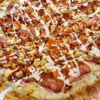 Chicken Bacon Ranch Pizza · Garlic chicken, bacon pieces, Canadian bacon and cooked tomatoes atop a ranch base, finished...