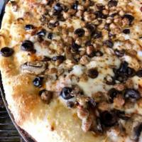 Combo Classico Pizza · Mounds of mushrooms, black olives and crumbled Italian sausage.