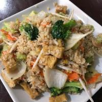 Fried Rice Vegetable and Tofu · Stir-fried jasmine steamed rice with egg, onions, peas and carrots with fried tofu and assor...