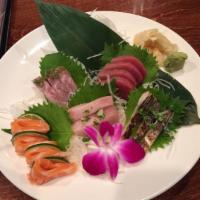Sashimi Dinner · Chef's choice of 18 pieces sashimi and sushi rice. Served with soup or salad.