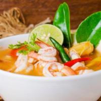 Shrimp Tom Yam Soup · A traditional hot and sour Thai soup made with our delicious lemongrass and galangal, kosher...