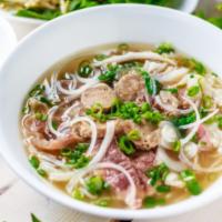 Pho · Beef noodle soup. Served with Fresh Vegetables.
Gluten free.