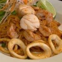 Seafood Phad Thai · Stir-fried rice noodles with shrimp, scallops, and calamari garnished with fresh bean sprout...