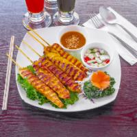 7. Satay Chicken · Sliced chicken marinated in Thai spices and grilled to perfection on bamboo skewers. Served ...