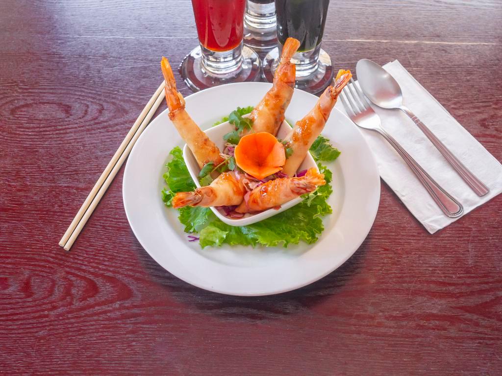 10. Bamboo Shrimp · Deep-fried shrimp wrapped in rice paper. Served with sweet and sour sauce.
