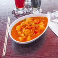  Red Curry · Red curry with bamboo shoots, bell peppers, basil leaves, and coconut milk. Served with jasm...