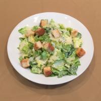 Caesar Salad · Romaine lettuce, parmesan cheese with a caesar dressing and garlic croutons.