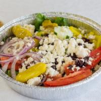 Greek Salad · Lettuce, tomatoes, onions, cucumbers, peperoncini, Kalamata olives and feta cheese.