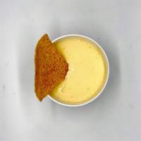 8 oz Melted Queso and Chips · Tony's best Melted Cheese Sauce with Fresh corn Tortilla Chips
