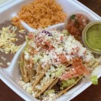 Campana Taco Pack · 4 Ground Beef hard shell tacos , with lettuce tomato onions and Cheese.
Rice, Refried Beans ...