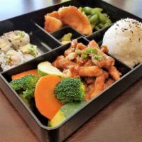 Teriyaki Bento · Chef choice sushi roll, appetizer, rice and soup or salad. Comes with choice of protein.