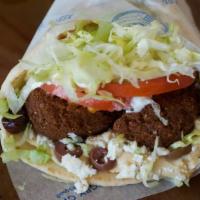 Philly Pita · Served with Mozzarella cheese, grilled peppers, grilled onions, lettuce, and Tzatziki. Add p...