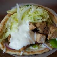 Chicken Pita · Grilled chicken breast with lettuce, onion, tomato, and Tzatziki sauce.