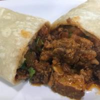 Chicharron Burrito · Spicy red chile pork and pico de gallo.