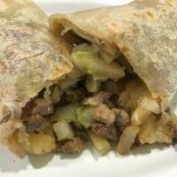 Pueblito Burrito · Carne asada, cooked pico de gallo, potato and cheese.
