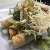 5 Flautas w/cheese · 5 shredded beef flautas (rolled tacos) topped with cheese, lettuce, tomato sauce and sour cr...