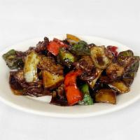 Beef with Black Bean Sauce · 豉椒牛肉 — Beef sautéed with peppers and onions, in a rich black bean sauce. 