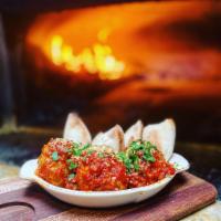Mikey’s Meatballs · 3 large meatballs made in-house with Jon's Naturals italian sausage, topped with marinara an...