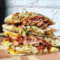 Club Sandwich · Pulled chicken, ham, bacon, cheddar, garlic mayo, lettuce, tomato, and wood fired bread.