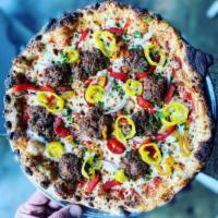 Meatball Pizza · House meatball, mozzarella, red onion, banana pepper, roasted peppers, and tomato.