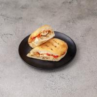 Grilled Chicken Panini · Come with fresh tomato, roasted peppers, mozzarella, and balsamic vinegar.