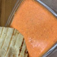 Spicy Feta Appetizer  · 8oz container Served with 2 Pita Bread