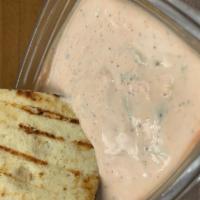 Spicy Tzatziki Appetizer  · 8oz Container Served with  2 Pita Bread