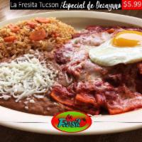 Breakfast Huevos Rancheros · Eggs over easy topped with house made ranchero sauce on a freshly made tostada with side of ...