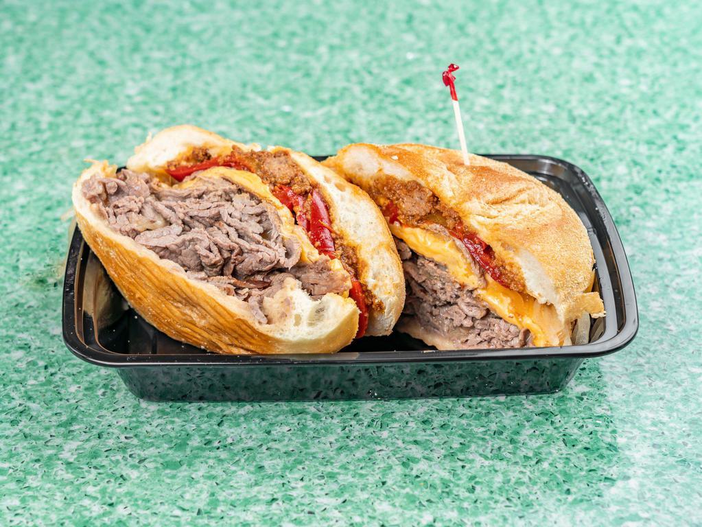 Jerrys Creations --Uncle Mick · Sliced steak cheese with chili, onions and hot peppers on a roll or wedge.