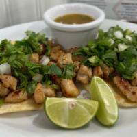 2 Mexican Street Tacos QB · Two tacos (flour or corn) with choice of meat, topped with onion and cilantro.