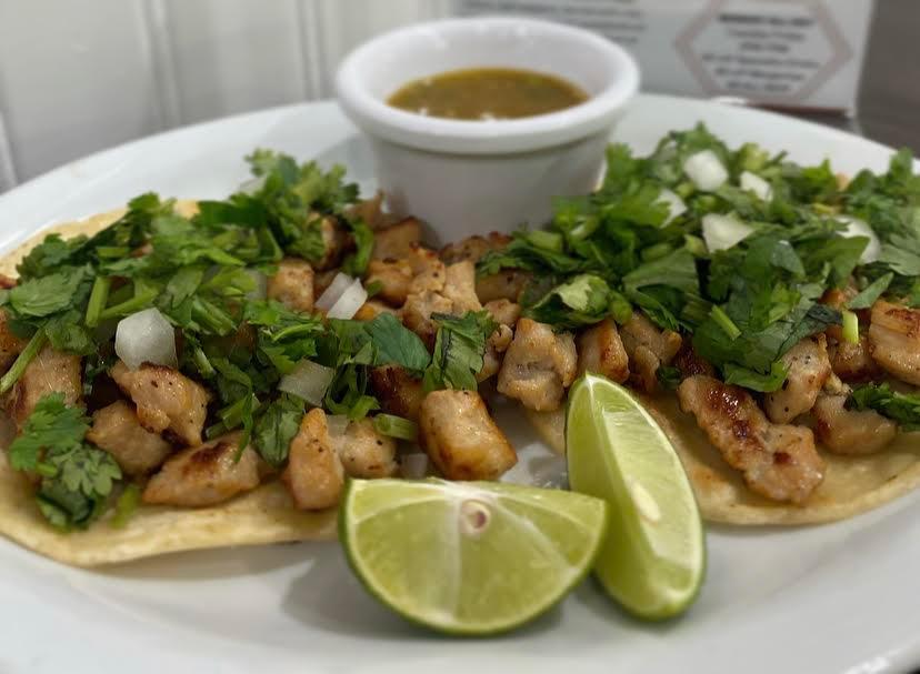 2 Mexican Street Tacos QB · Two tacos (flour or corn) with choice of meat, topped with onion and cilantro.