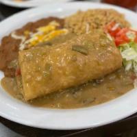Chimichanga · Chimichanga filled with choice of meat, topped with red or green sauce, served with rice, be...