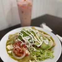 Nana's Enchiladas · Four chicken enchiladas topped with green sauce, lettuce, tomato, onion, cheese, sliced avoc...
