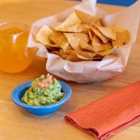 Guacamole + Chips + Salsa · A creamy dip made from avocado.